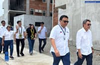 DHSUD Secretary Jose Ramon Aliling, Pag-IBIG Fund Chief Executive Officer Marilene Acosta, Governor Jose Enrique Garcia III, private sector partners, and other local officials conduct a site tour of the Pilar 4PH Project in Bataan.