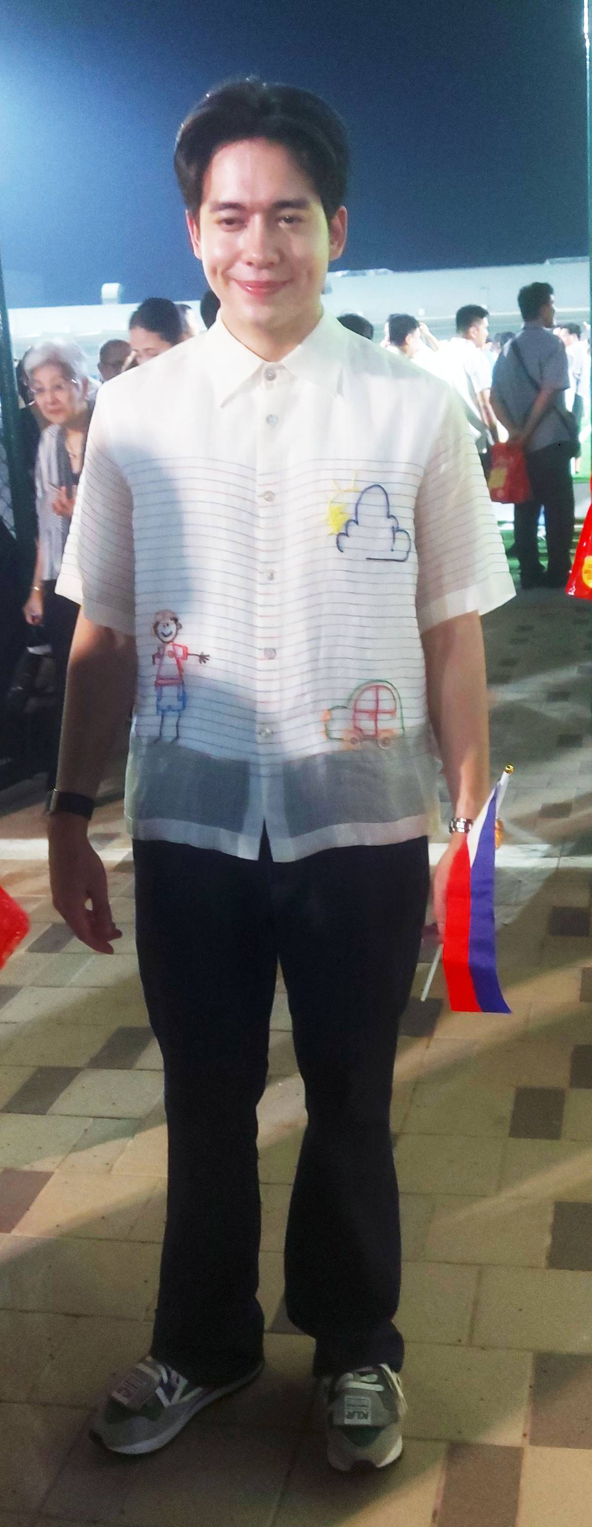 Actor Jameson Blake wearing a modern barong Tagalog at the SM and Bench collaboration event.