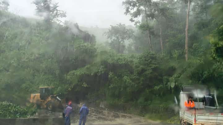A landslide triggered by heavy rains from tropical storm ‘Kiyapo’ blocks a portion of the Ilocos Norte-Apayao Road in Barangay Maananteng, Solsona, on Friday.