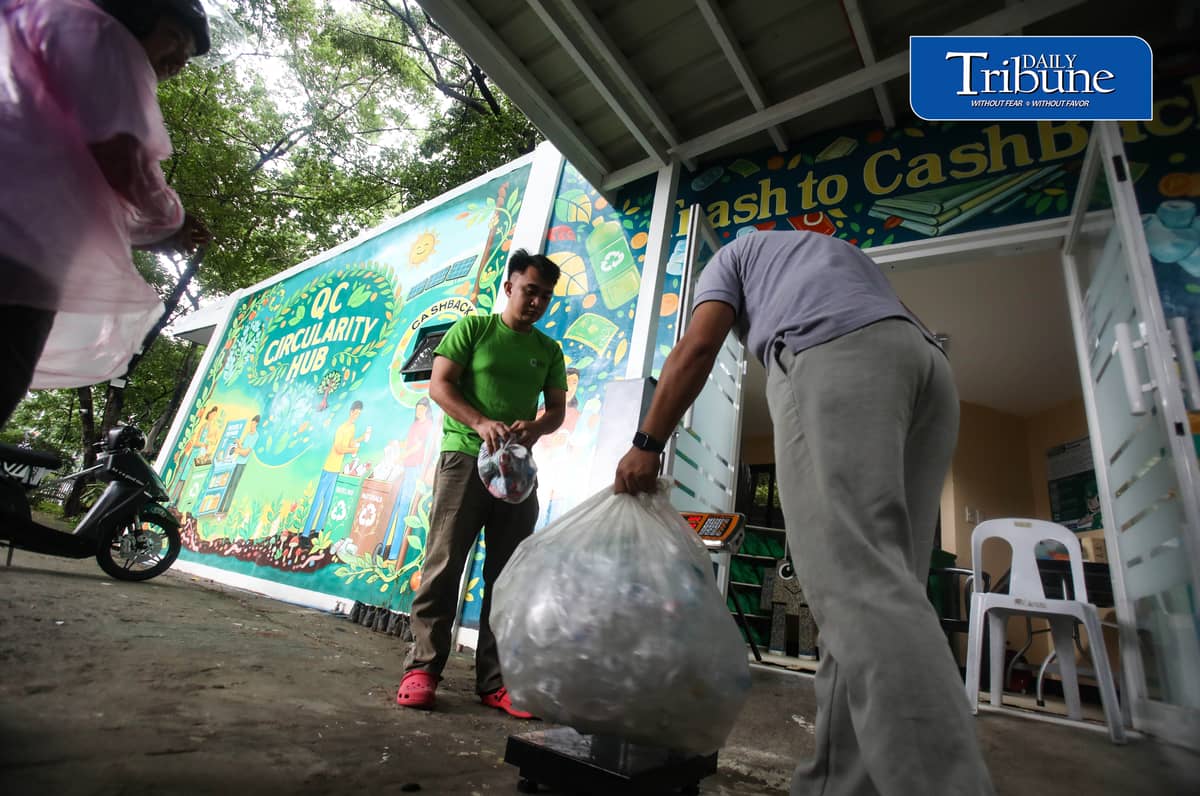 (July 24 2026) Personnel from Quezon City Hall and from Basic Environmental Systems and Technologies, Inc (Best) weighing the plastic bottle and trash at the newly open QC Circularity Hub at City Hall compound, East avenue gate open Monday to Friday 8am to 5pm. The Circularity hub an initiative aimed at encouraging QCitizens to practice the 4Rs: Reduce, Reuse, Recycle, and Recover, the hub offers innovative and beneficial, features Trash to Cash Back, Organic Food Processor, Kilo/s Kyusi Store, Rainwater Harvesting System. Photo/Analy Labor