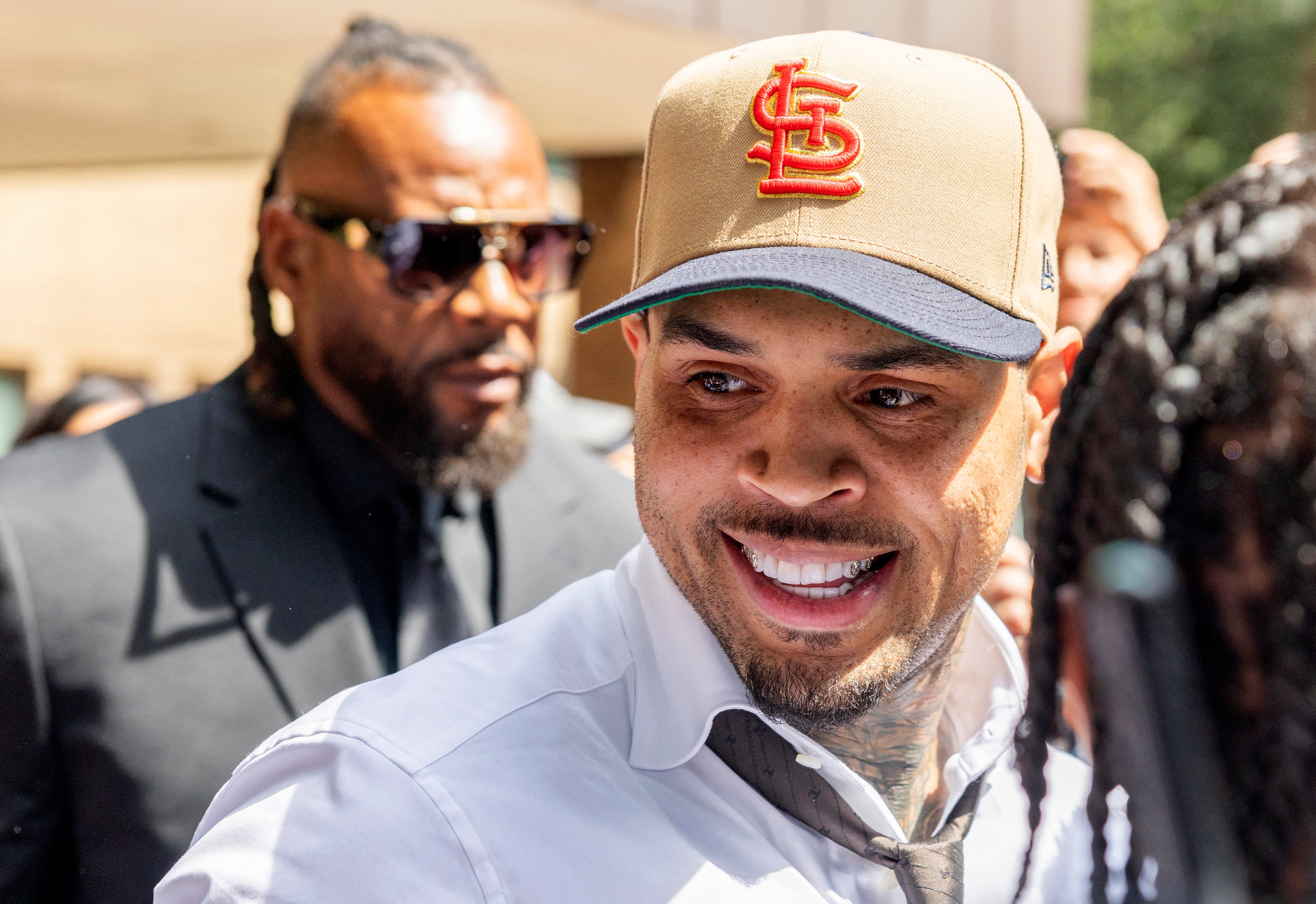 US singer Chris Brown admits new affray charge, avoids UK trial