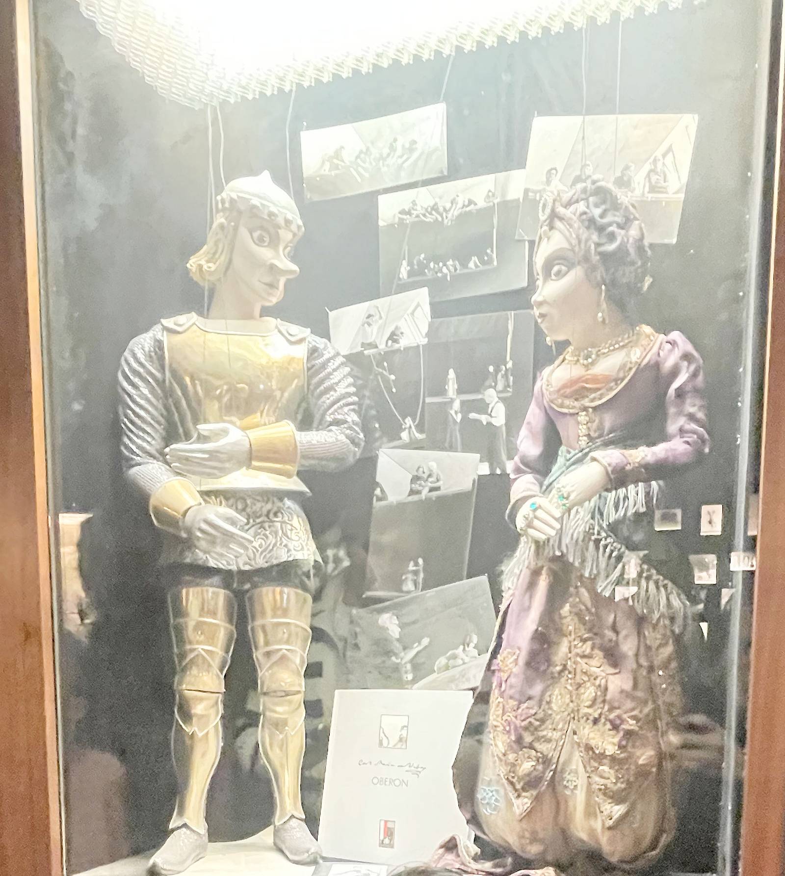 Marionettes and their photos when they were presented in the shows.