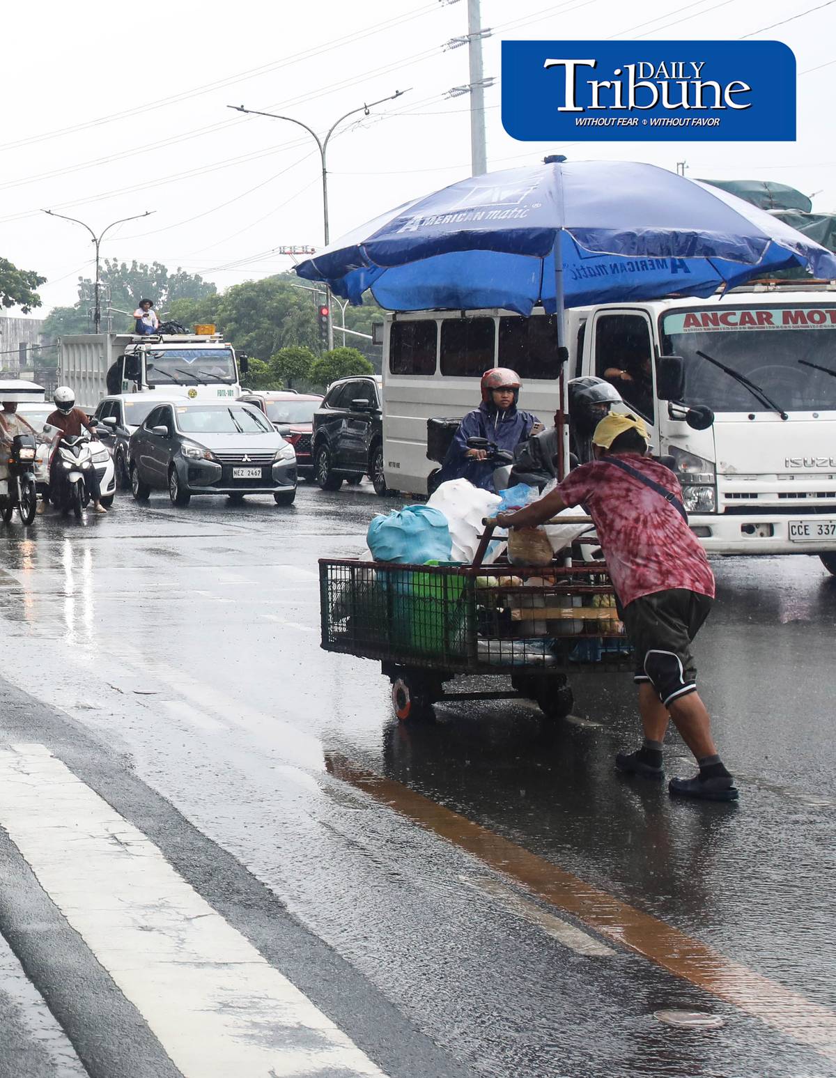(July 25 2026) Pedestrians use umbrellas when suddenly heavy downpour in Quezon City on Saturday July 26 2026. PAGASA said light to moderate with occasional heavy rains affecting Metro Manila enhanced by southwest monsoon. Photo/Analy Labor