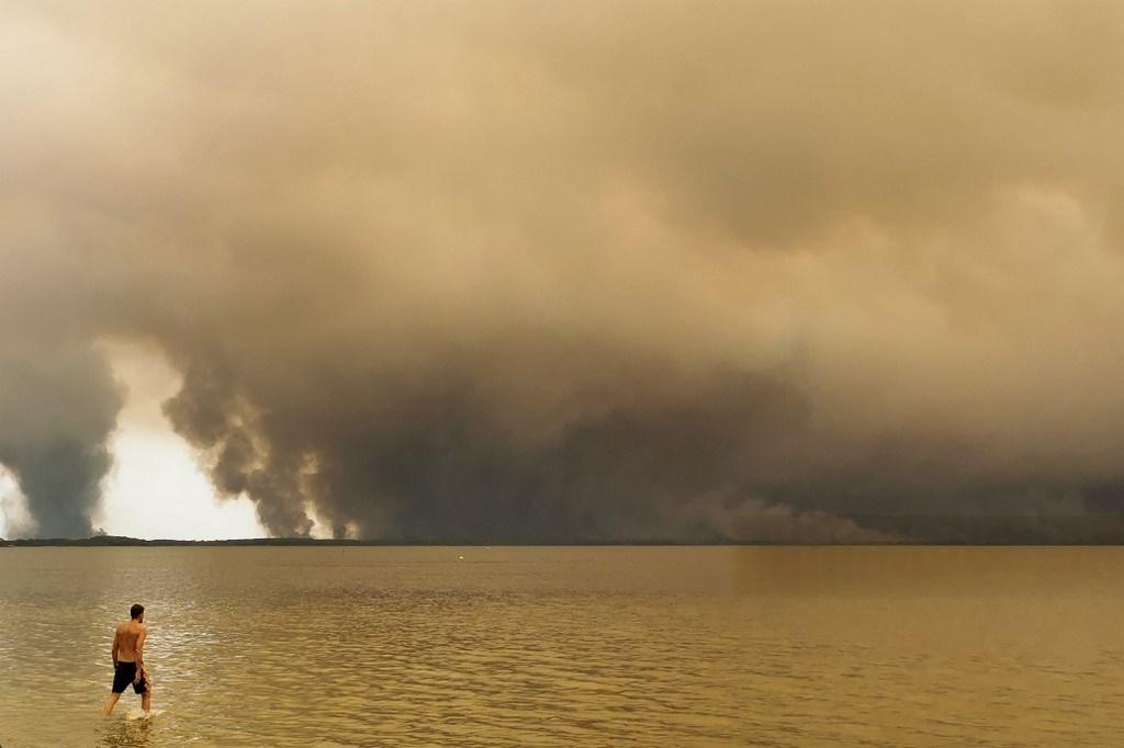 Untamed wildfires force over 160,000 to flee 