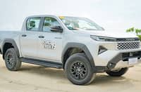 PARKED by the shore, the all-new Hilux 2.8 4x2 G shows its sharper body and wider honeycomb-pattern grille.