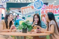 Shoppers enjoy coffee and conversation.