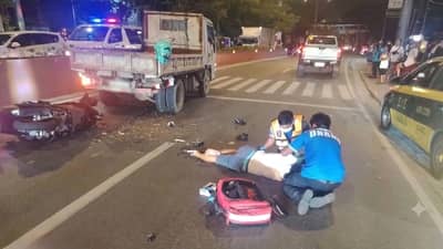 FIRST responders check on the female motorcyclist who crashed into the back of a stationary truck along Felix Avenue in Cainta, Rizal. The truck had stopped to yield to a crossing motorcycle when the victim’s speeding motorcycle hit its rear right side.
