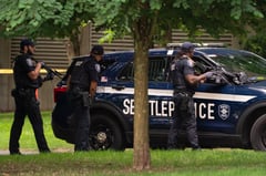 Shooter arrested after killing three