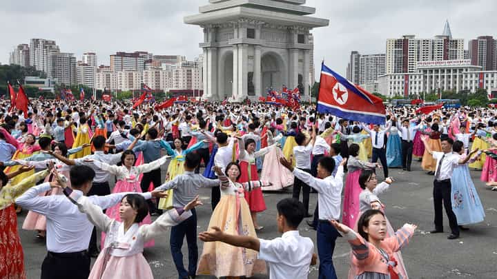 YOUTH and students dance at the plaza of the Arch of Triumph to mark the 73rd anniversary of the end of the Korean War in Pyongyang, North Korea on 27 July 2026.