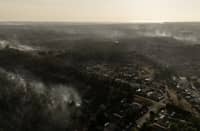 SMOKE billows over a forested area near Le Porge in southwestern France as a massive wildfire continues to burn through the Gironde region, home to Bordeaux.
