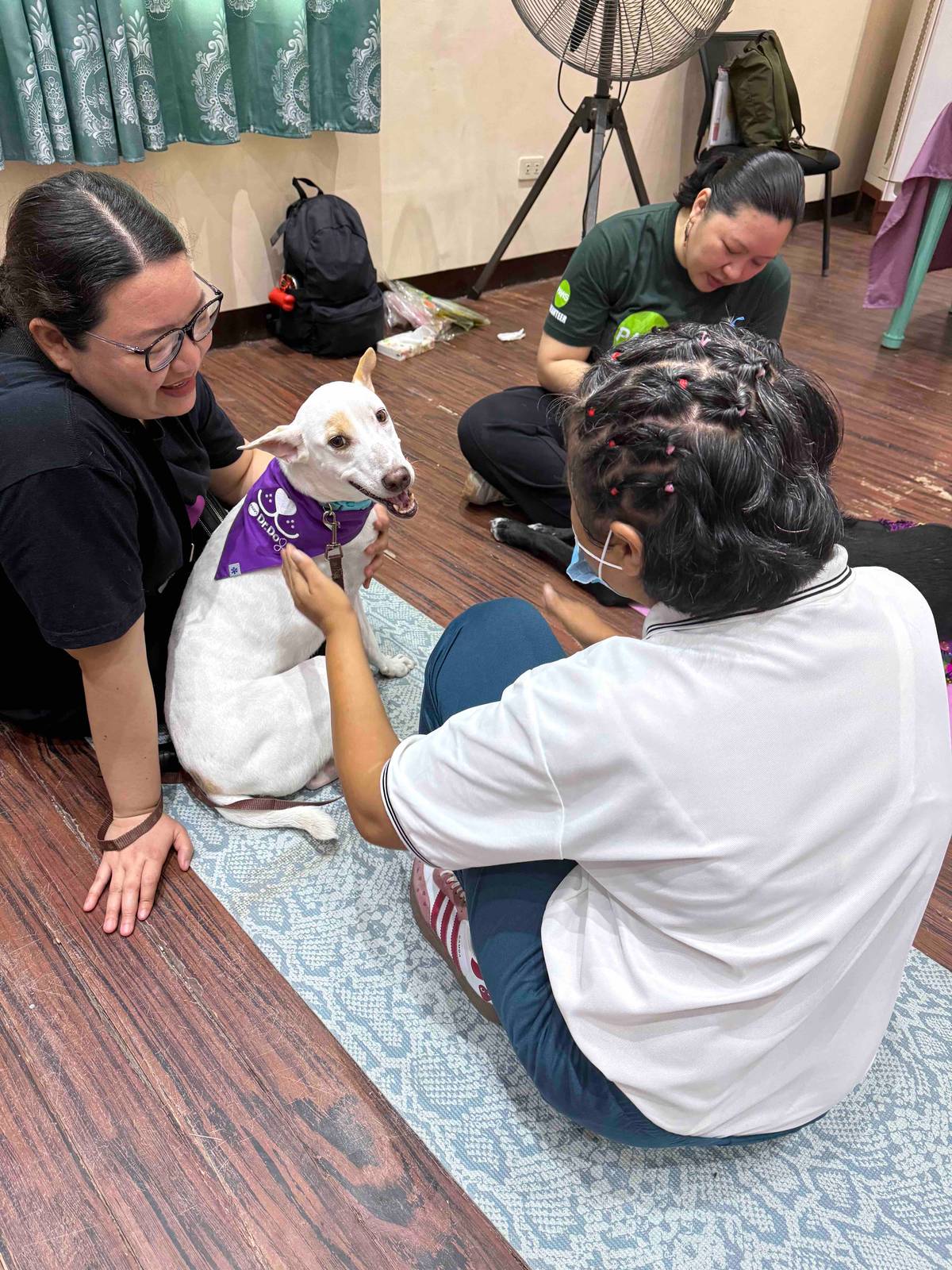 Dr. Blake provides therapy for one of his patients, a resident at DSWD Sanctuary.