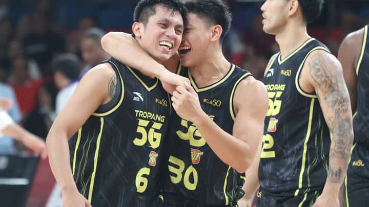REY Nambatac gets a hug from Sean Quitevis after knocking down the game-winning basket that lifted TNT Tropang 5G to a 110-107 win over Converge in the PBA Season 50 Governors’ Cup.