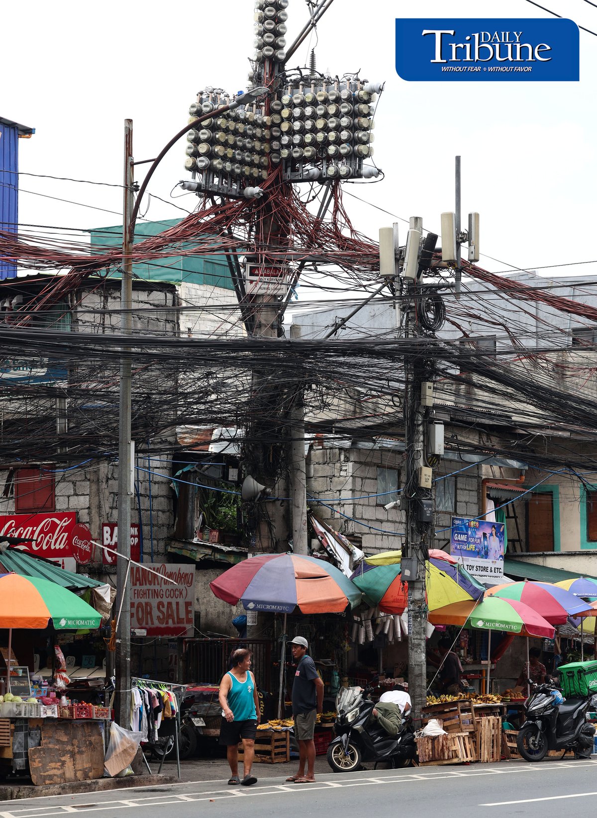 (July 30 2026) Tangled wires known as Spaghetti wires are seen hanging along E. Rodriguez Avenue in Quezon City on Thursday July 30 2026. The recent SONA of President Ferdinand Marcos Jr., called for an end to consumer-paid electricity system losses through amendments to the Electric Power Industry Reform Act (EPIRA) of 2001. The Department of Energy (DOE) said the government may need about a year to fully remove the system-loss charge from consumers’ electricity bills, with Energy Secretary Sharon Garin saying the policy could be fully implemented by 2027. Photo/Analy Labor