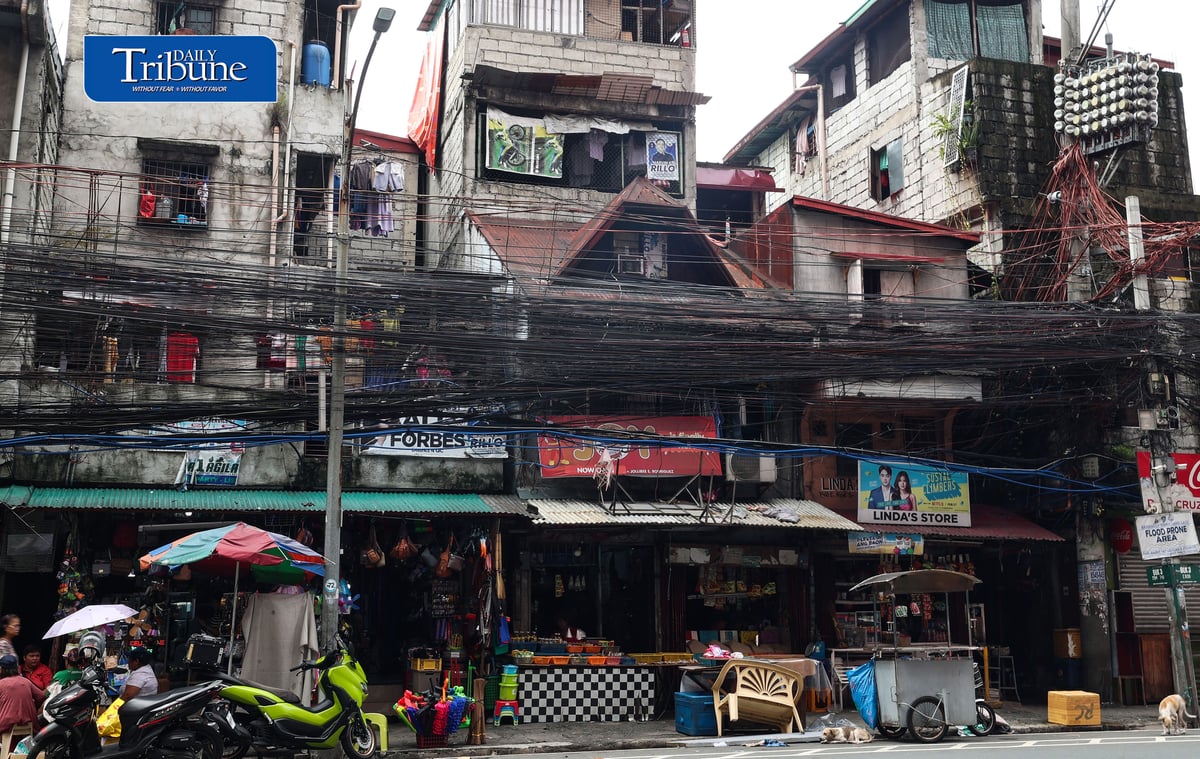 (July 30 2026) Tangled wires known as Spaghetti wires are seen hanging along E. Rodriguez Avenue in Quezon City on Thursday July 30 2026. The recent SONA of President Ferdinand Marcos Jr., called for an end to consumer-paid electricity system losses through amendments to the Electric Power Industry Reform Act (EPIRA) of 2001. The Department of Energy (DOE) said the government may need about a year to fully remove the system-loss charge from consumers’ electricity bills, with Energy Secretary Sharon Garin saying the policy could be fully implemented by 2027. Photo/Analy Labor