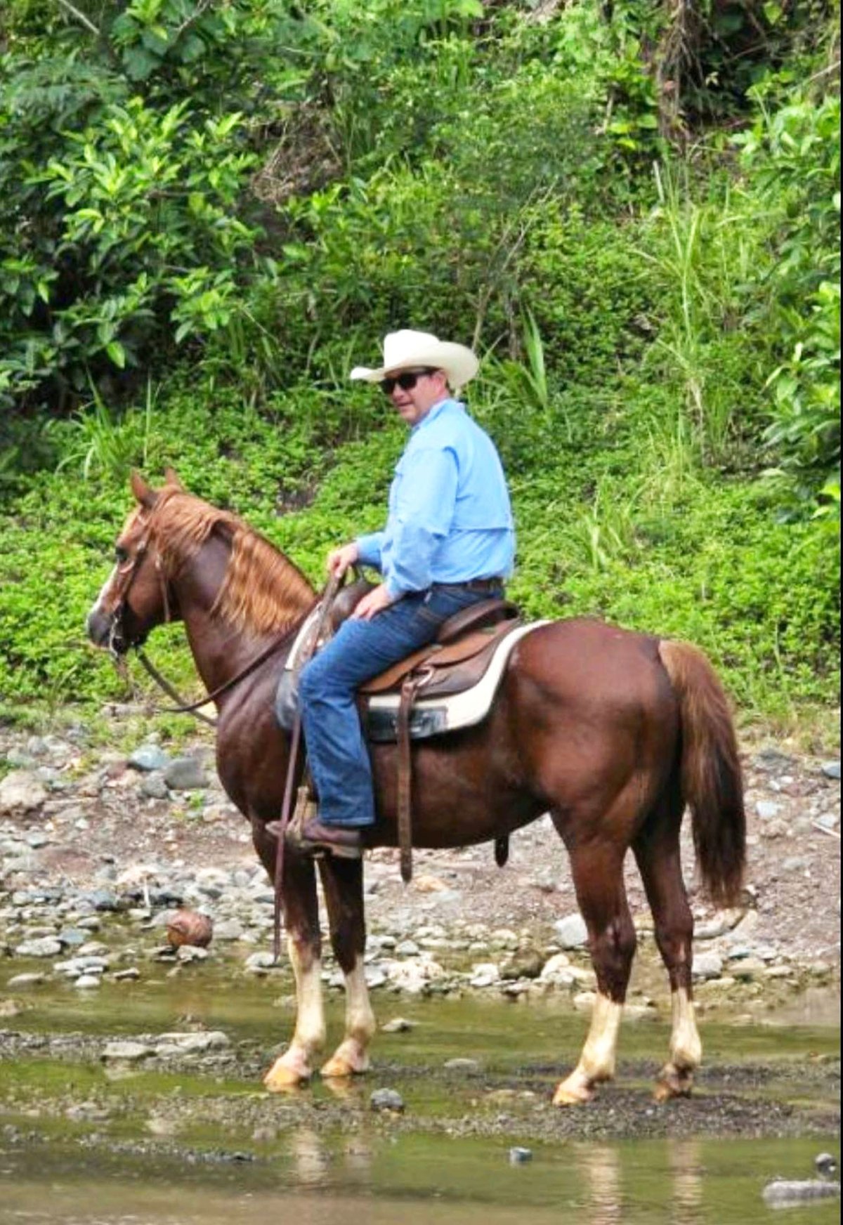 Eduard Loop enjoys a trail ride on one of his Quarter Horses, High Brown.
