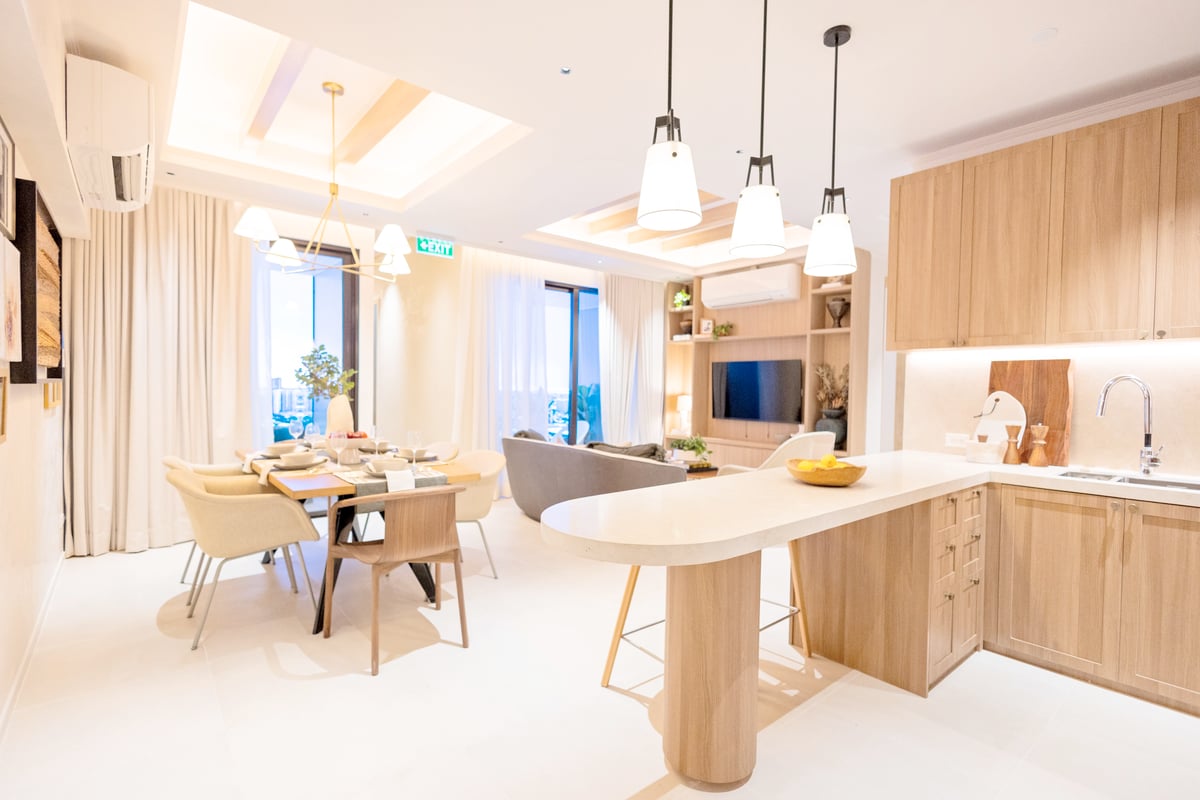 Two Bedroom, Living, Dining, and Kitchen Area — Actual Model Unit.
