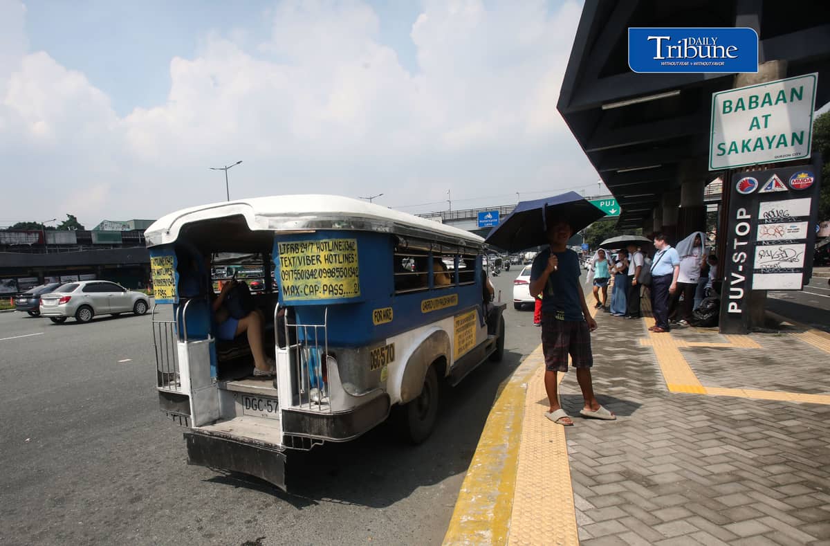 (July 31 2026) Public transport load and unload passengers at Philcoa along Commonwealth avenue in Quezon City on Friday July 31 2026. The Land Transportation Franchising and Regulatory Board (LTFRB) has started the deliberation on the fare hike petitions filed by five transport groups amid the increases in fuel prices brought by the ongoing Middle East conflict. The petitions cover public utility jeepneys (PUJ), passenger buses, UV Express, taxis, and motorcycle taxis, fare hike petitions were filed by PISTON, Metro Comet Transport Service Cooperative, UV Express National Alliance of the Philippines, United Transportation Coalition of the Philippines, and Manibela. Photo/Analy Labor
