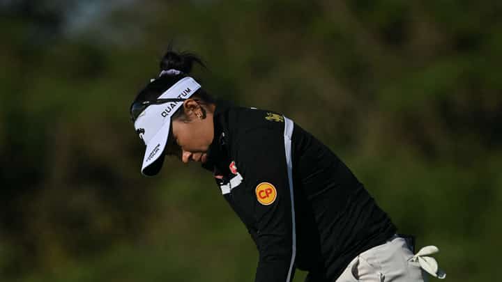 THAILAND’s Jeeno Thitikul lines up a putt on the 17th green during the opening round of the 2026 Women’s British Open Golf Championship at Royal Lytham & St. Anne’s Golf Club in north-west England on Thursday.