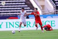 Second-half surge powers Philippines past Laos.