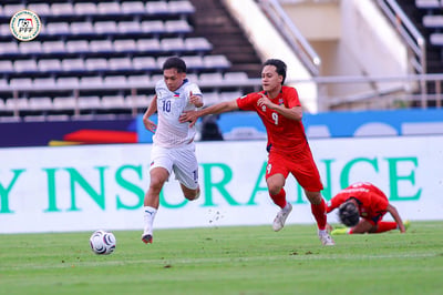 Second-half surge powers Philippines past Laos.