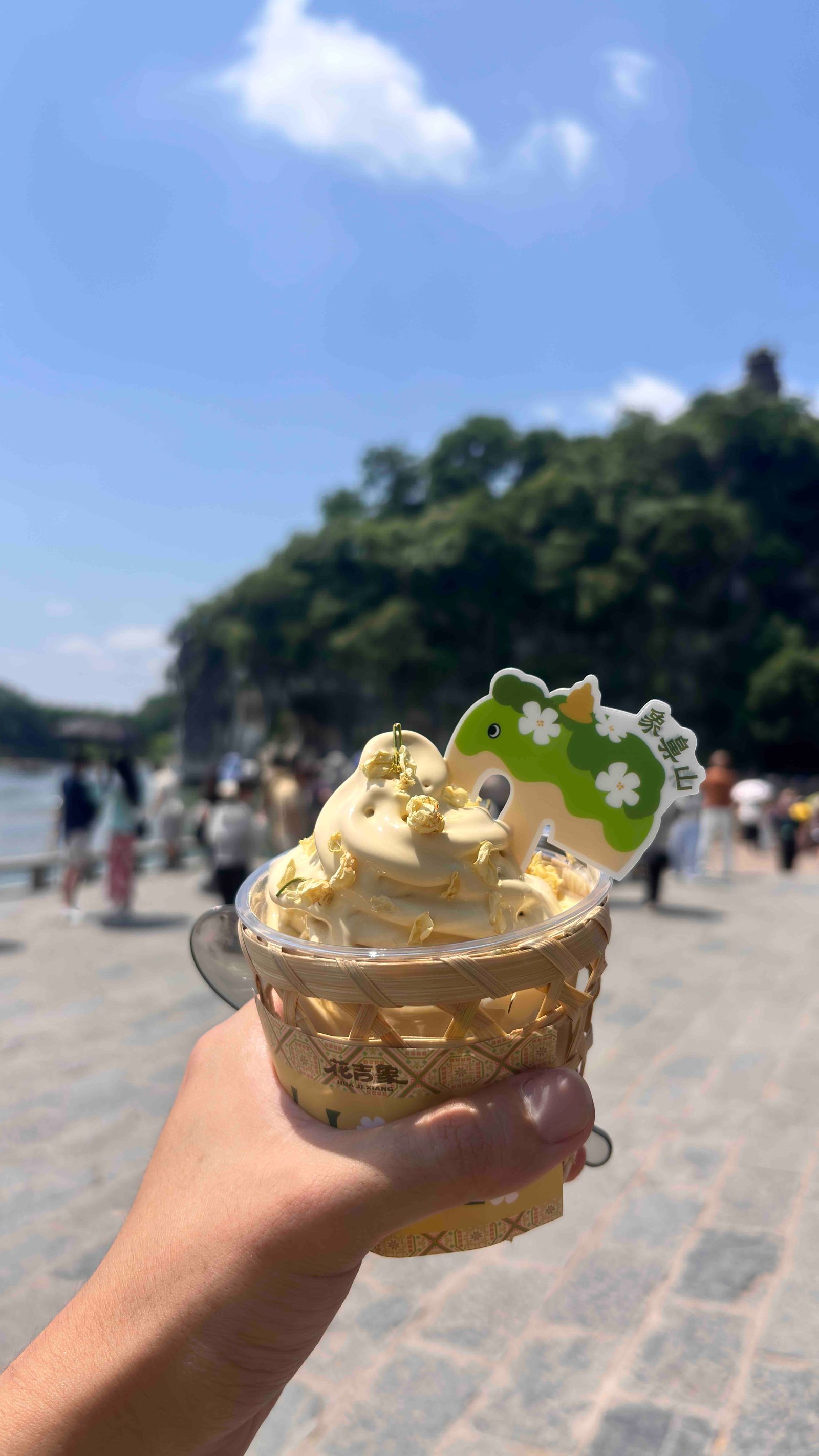 Osmanthus ice cream served in a woven bamboo basket.