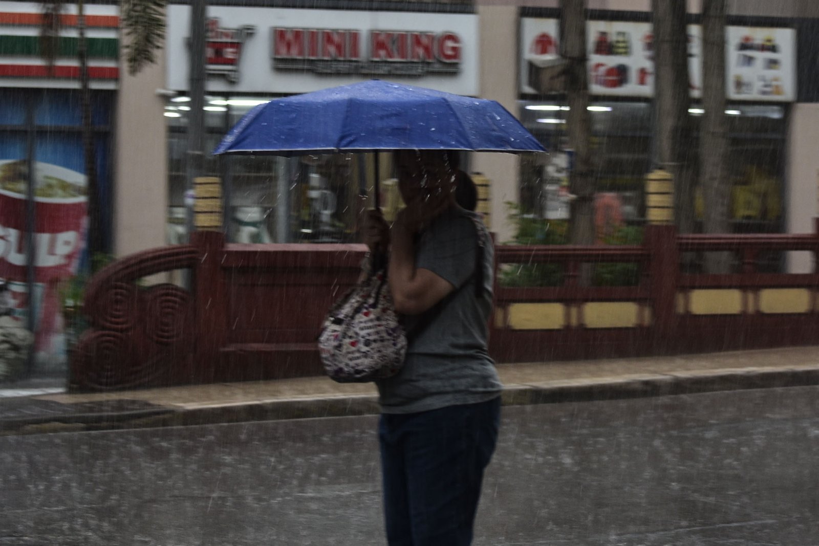 A localized thunderstorm blankets Manila with heavy rain beneath dark clouds on Aug. 1. | Zedrich Xylak Madrid
