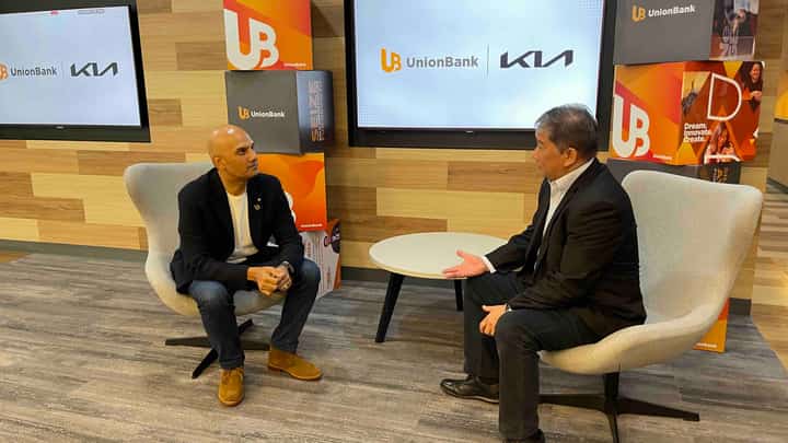 PARTNERSHIP brings together UnionBank executive vice president Mukul Sukhani, (left) and Kia Philippines managing director Jay Lopez to offer flexible payment options to Kia buyers.