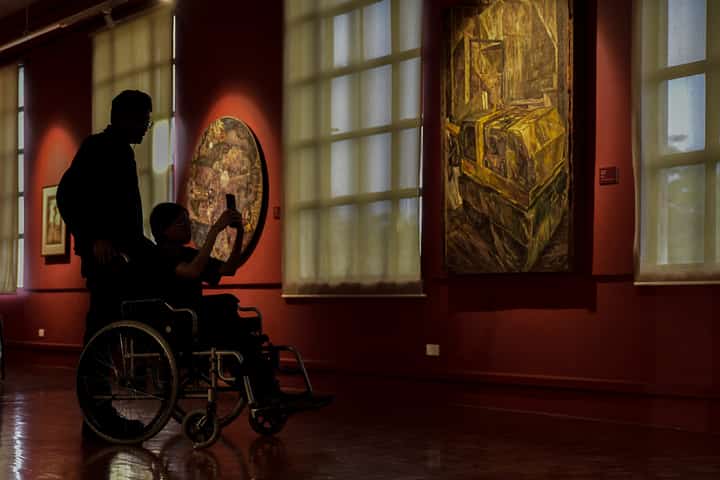 Visitors explore historic artworks at the National Museum of Fine Arts