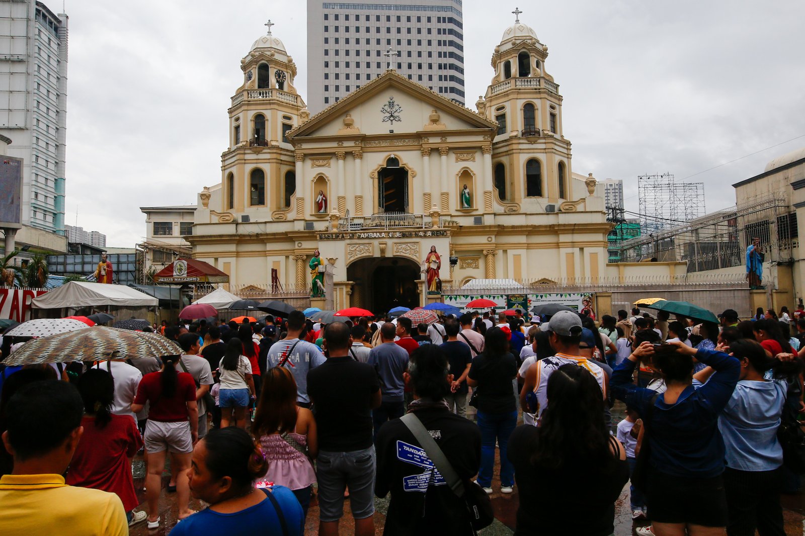 Catholic devotees attend the First Sunday Mass on 2 August 2026 at the Minor Basilica and National Shrine of Jesus Nazareno despite slight rain showers brought by localized thunderstorms.