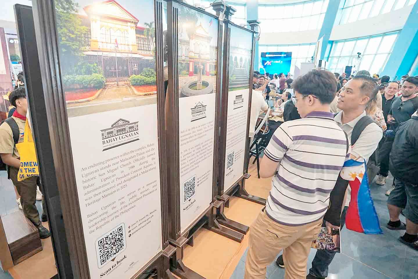 Attendees of the HistoEx 2026 at the SM Mall of Asia in Pasay examine the renovated historical edifices of Malacañang Palace, including the Bahay Ugnayan and the Goldenberg Mansion.