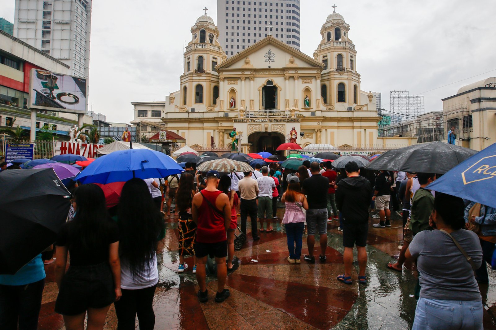Catholic devotees attend the First Sunday Mass on 2 August 2026 at the Minor Basilica and National Shrine of Jesus Nazareno despite slight rain showers brought by localized thunderstorms.