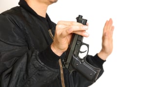 Accused shooter surrenders