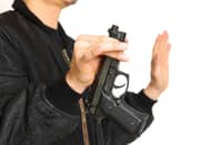 Accused shooter surrenders