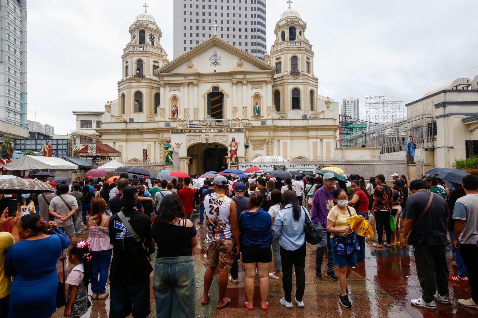 Catholic devotees attend the First Sunday Mass on 2 August 2026 at the Minor Basilica and National Shrine of Jesus Nazareno despite slight rain showers brought by localized thunderstorms.