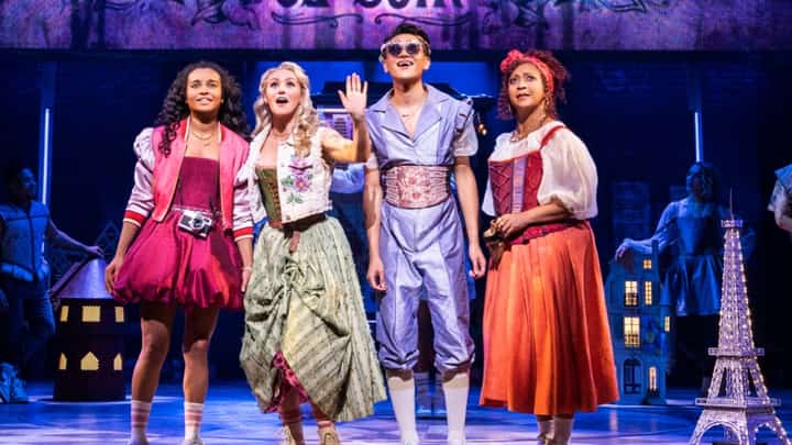 A scene from the musical '& Juliet' featuring characters in stylized Elizabethan costumes.