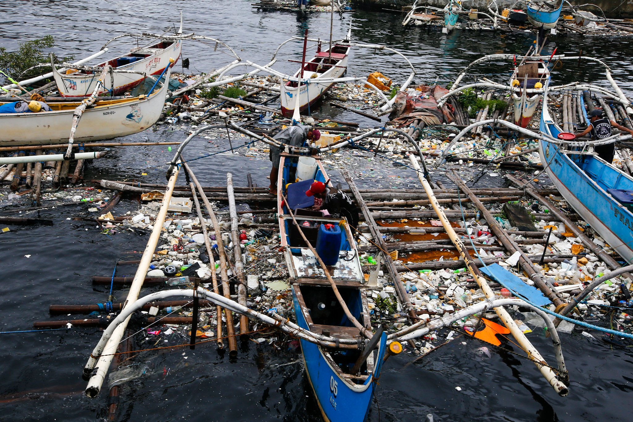 Fishermen prepare for the storm