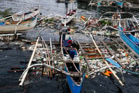 Fishermen prepare for the storm