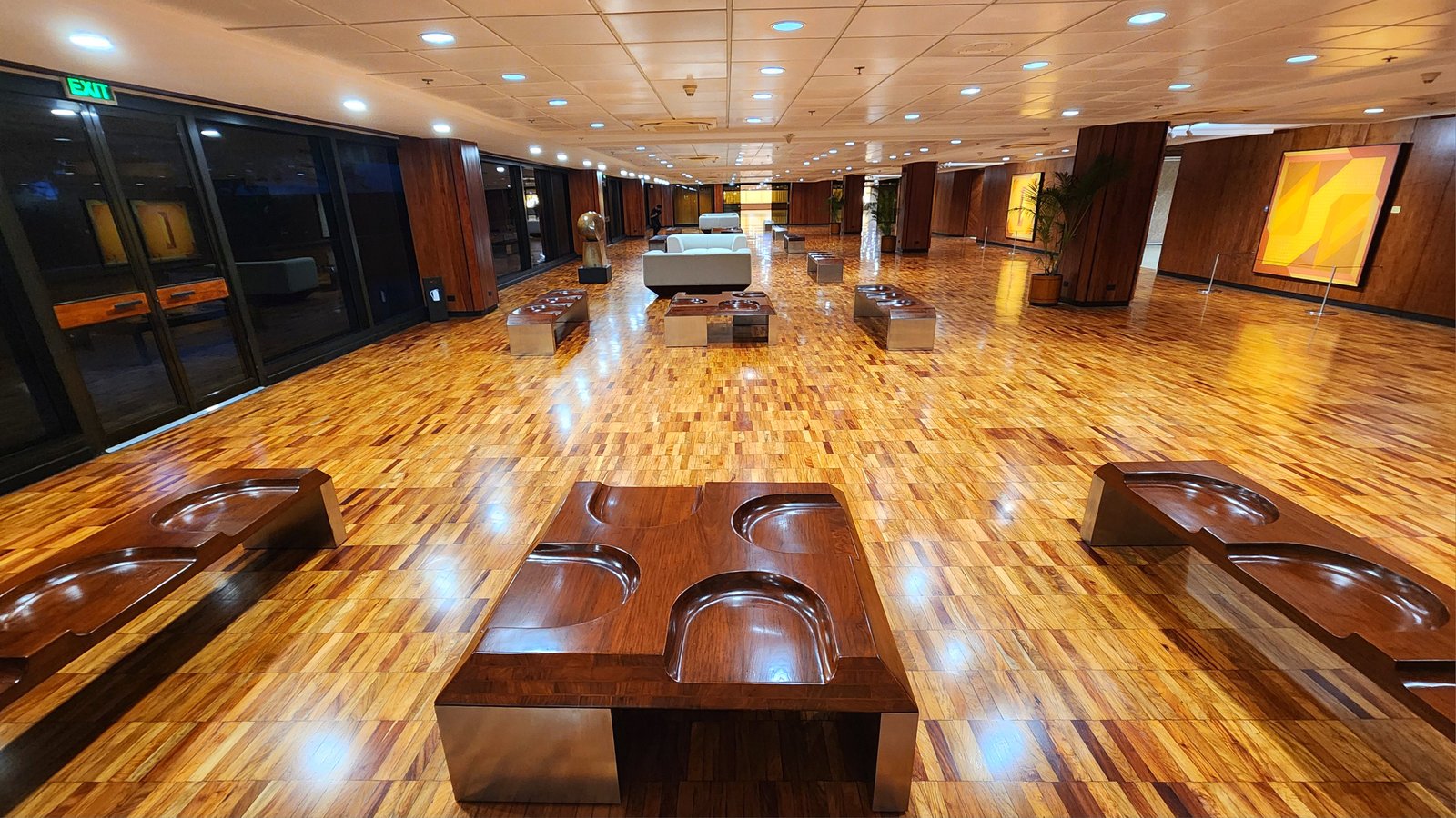 National Artist Napoleon V. Abueva’s sculptural wooden furniture at the hallway.