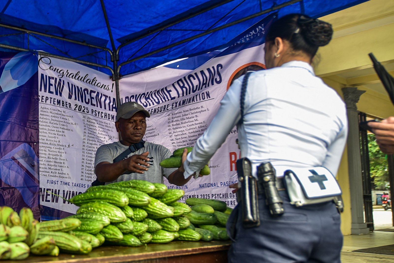 Ayta farmers from Magsasakang Ayta ng Floridablanca, Pampanga sells fresh vegetables and other farm products at Adamson University in Manila on Monday, Aug. 3.

The mobile market aims to support the livelihoods of Ayta farming families while giving consumers direct access to fresh, locally grown produce.

The market will continue on Tuesday. | Zedrich Xylak Madrid