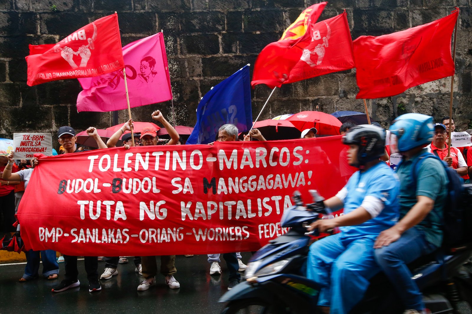 Workers stage a lightning rally on Monday, 3 August 2026, outside the Department of Labor and Employment (DOLE) Central Office, slamming the suspension of the ₱85 daily wage hike in Metro Manila