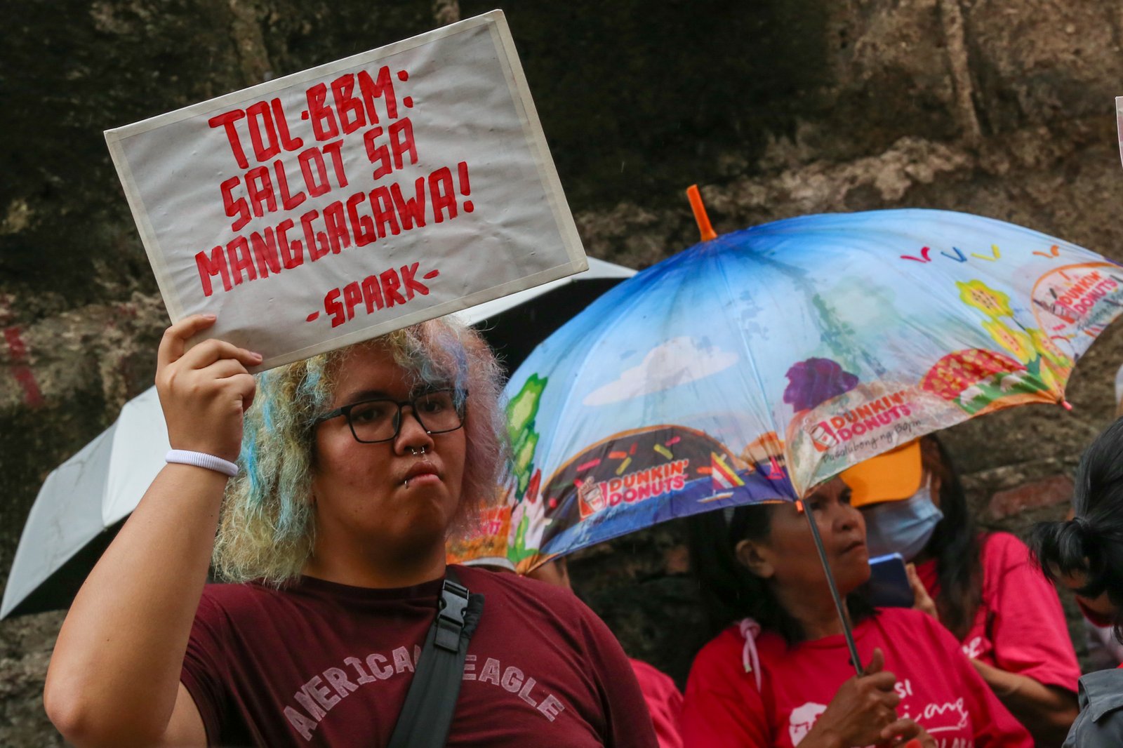 Workers stage a lightning rally on Monday, 3 August 2026, outside the Department of Labor and Employment (DOLE) Central Office, slamming the suspension of the ₱85 daily wage hike in Metro Manila