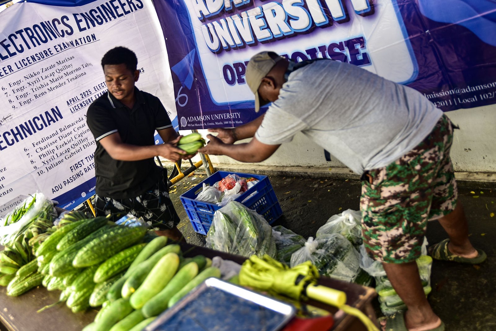 Ayta farmers from Magsasakang Ayta ng Floridablanca, Pampanga sells fresh vegetables and other farm products at Adamson University in Manila on Monday, Aug. 3.

The mobile market aims to support the livelihoods of Ayta farming families while giving consumers direct access to fresh, locally grown produce.

The market will continue on Tuesday. | Zedrich Xylak Madrid