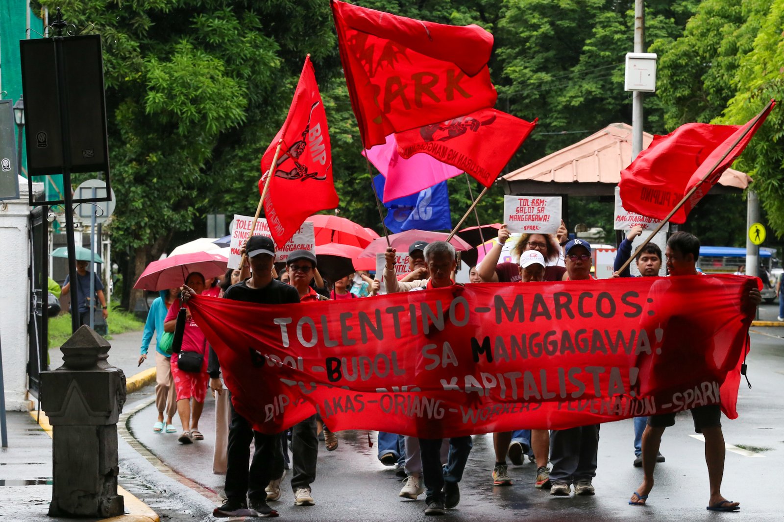 Workers stage a lightning rally on Monday, 3 August 2026, outside the Department of Labor and Employment (DOLE) Central Office, slamming the suspension of the ₱85 daily wage hike in Metro Manila