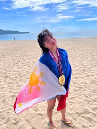 YANI Alexii Lopez savors the sweetness of her victory after winning a gold medal in the 2026 United World Wrestling Asian & Oceania Grappling Championships in Da Nang, Vietnam.