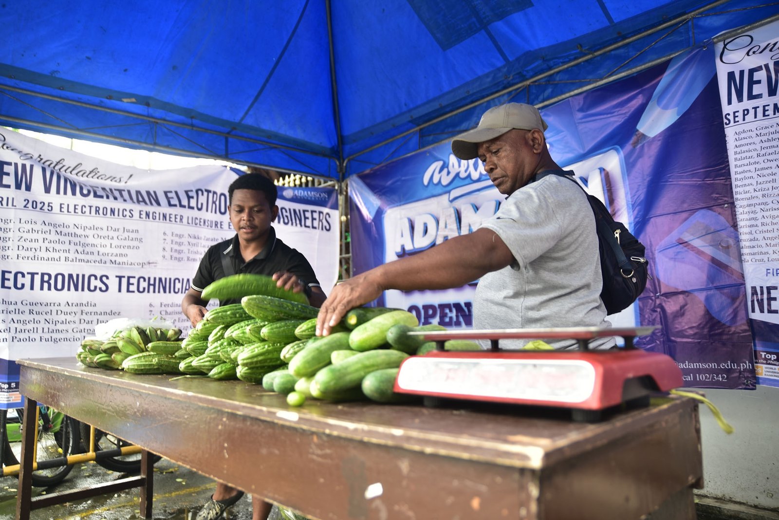 Ayta farmers from Magsasakang Ayta ng Floridablanca, Pampanga sells fresh vegetables and other farm products at Adamson University in Manila on Monday, Aug. 3.

The mobile market aims to support the livelihoods of Ayta farming families while giving consumers direct access to fresh, locally grown produce.

The market will continue on Tuesday. | Zedrich Xylak Madrid