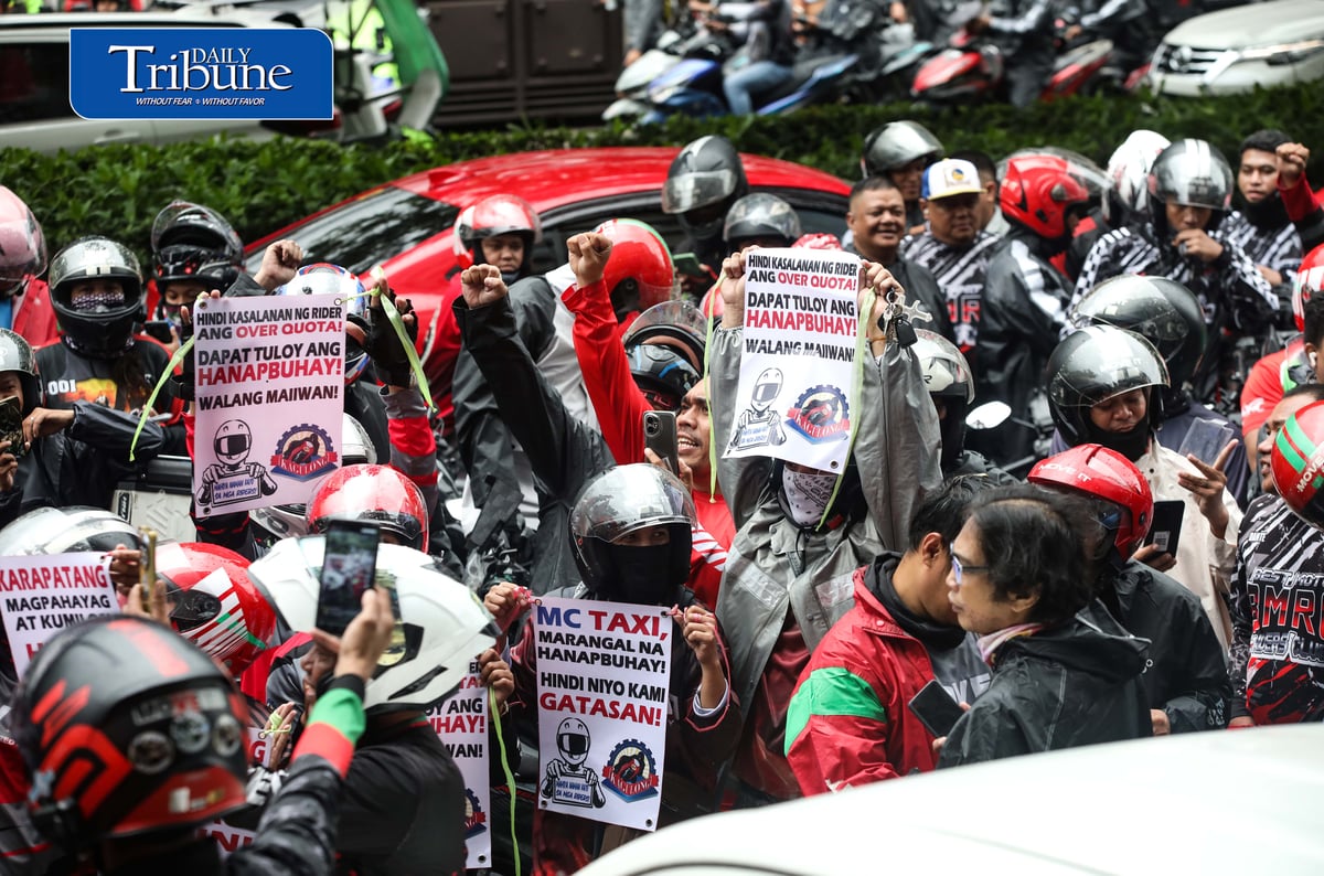 (August 04 2026) Motor taxi riders from various ride-hailing applications conduct a motorcade from people power monument to outside of the Land Transportation Franchising and Regulatory Board office along Kalayaan Avenue in Quezon City on Tuesday August 4 2026, to stage a protest, the protesters opposed a reported move to end “multi-homing,” the practice that allows riders to work across multiple ride-hailing platforms. They claimed the policy would prevent them from switching between applications and alleged that the change is intended to accommodate a new market entrant. Photo/Analy Labor