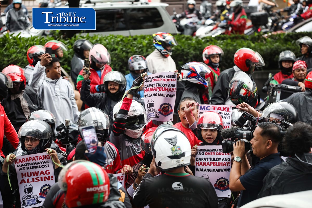 (August 04 2026) Motor taxi riders from various ride-hailing applications conduct a motorcade from people power monument to outside of the Land Transportation Franchising and Regulatory Board office along Kalayaan Avenue in Quezon City on Tuesday August 4 2026, to stage a protest, the protesters opposed a reported move to end “multi-homing,” the practice that allows riders to work across multiple ride-hailing platforms. They claimed the policy would prevent them from switching between applications and alleged that the change is intended to accommodate a new market entrant. Photo/Analy Labor