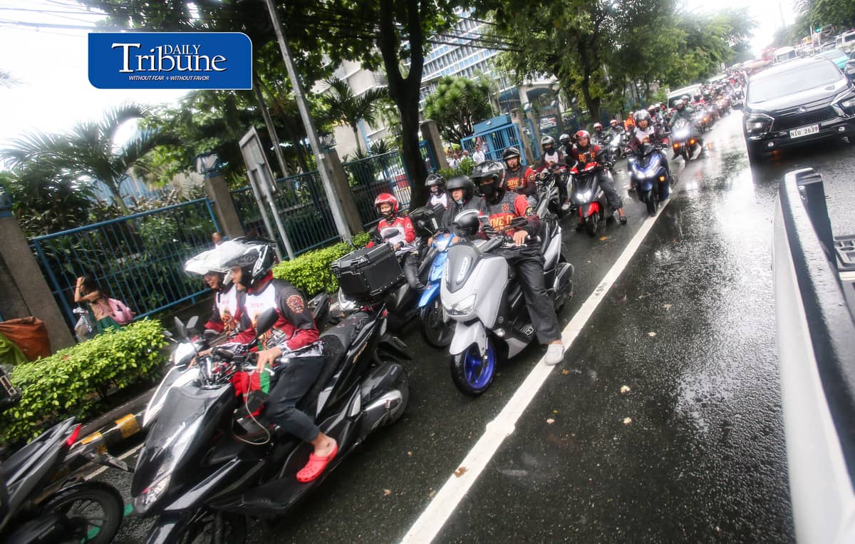 (August 04 2026) Motor taxi riders from various ride-hailing applications conduct a motorcade from people power monument to outside of the Land Transportation Franchising and Regulatory Board office along Kalayaan Avenue in Quezon City on Tuesday August 4 2026, to stage a protest, the protesters opposed a reported move to end “multi-homing,” the practice that allows riders to work across multiple ride-hailing platforms. They claimed the policy would prevent them from switching between applications and alleged that the change is intended to accommodate a new market entrant. Photo/Analy Labor