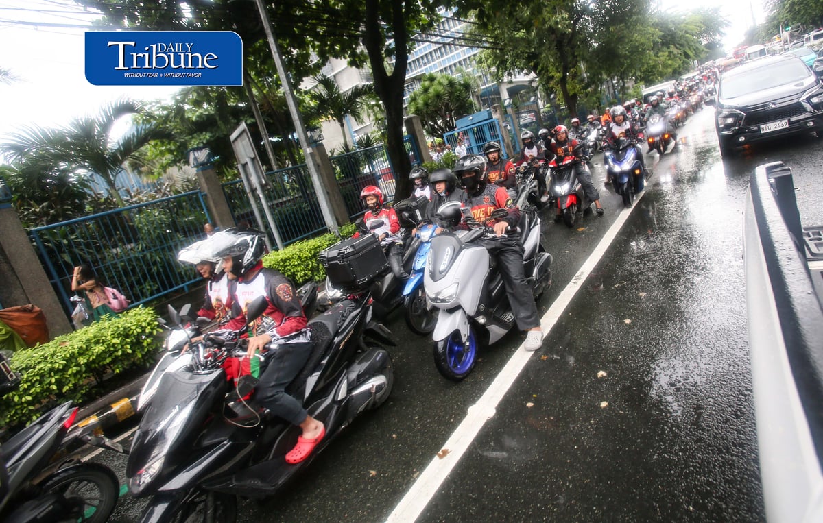 (August 04 2026) Motor taxi riders from various ride-hailing applications conduct a motorcade from people power monument to outside of the Land Transportation Franchising and Regulatory Board office along Kalayaan Avenue in Quezon City on Tuesday August 4 2026, to stage a protest, the protesters opposed a reported move to end “multi-homing,” the practice that allows riders to work across multiple ride-hailing platforms. They claimed the policy would prevent them from switching between applications and alleged that the change is intended to accommodate a new market entrant. Photo/Analy Labor
