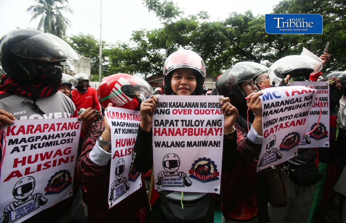 (August 04 2026) Motor taxi riders from various ride-hailing applications conduct a motorcade from people power monument to outside of the Land Transportation Franchising and Regulatory Board office along Kalayaan Avenue in Quezon City on Tuesday August 4 2026, to stage a protest, the protesters opposed a reported move to end “multi-homing,” the practice that allows riders to work across multiple ride-hailing platforms. They claimed the policy would prevent them from switching between applications and alleged that the change is intended to accommodate a new market entrant. Photo/Analy Labor